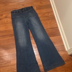 Brand new Never worn flare leg stretch jeans.